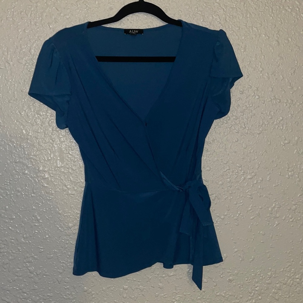 Blue tie front shirt with clasps to open shirt completely